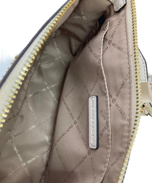 MICHAEL KORS（マイケル・コース）MICHAEL KORS (マイケル・コース) モノグラム 2way マルチポーチ スモール クロスボディバッグ ベージュの古着・服飾アイテム