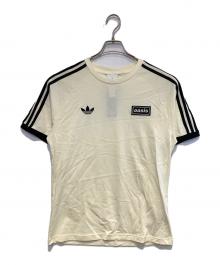 adidas×oasis（アディダス×オアシス）の古着「ツアースリーストライプス Tシャツ」｜アイボリー×ブラック