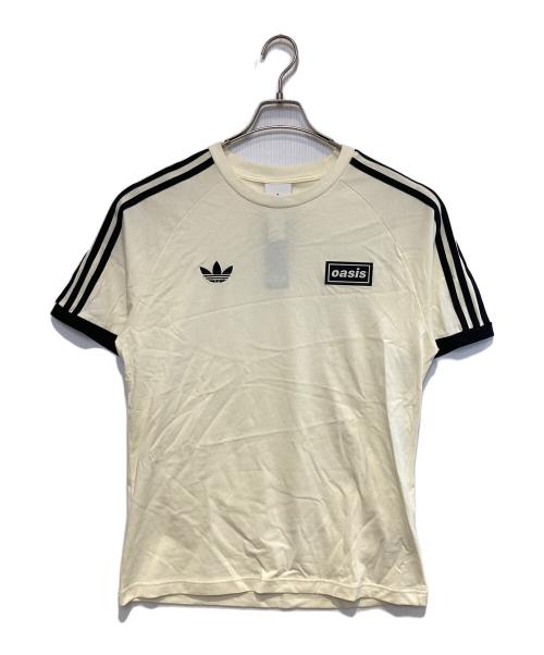 adidas（アディダス）adidas (アディダス) oasis (オアシス) ツアースリーストライプス Tシャツ アイボリー×ブラック サイズ:XL 未使用品の古着・服飾アイテム