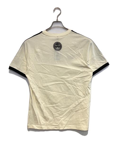 adidas（アディダス）adidas (アディダス) oasis (オアシス) ツアースリーストライプス Tシャツ アイボリー×ブラック サイズ:XL 未使用品の古着・服飾アイテム