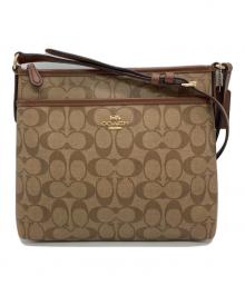 COACH（コーチ）の古着「シグネチャー ショルダーバッグ」｜ブラウン