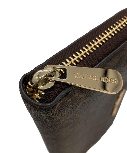 MICHAEL KORS（マイケル・コース）MICHAEL KORS (マイケル・コース) JET SET TRAVELジップアラウンドコンチネンタルウォレット ブラウンの古着・服飾アイテム