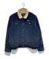 Patagonia（パタゴニア）の古着「M's Pile Lined Trucker Jkt」｜ネイビー
