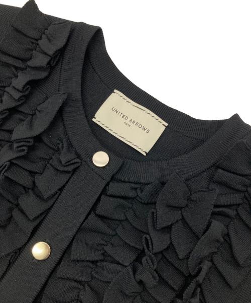 UNITED ARROWS TOKYO（ユナイテッドアローズトウキョウ）UNITED ARROWS TOKYO (ユナイテッドアローズトウキョウ) ミニフリルニットカーディガン ブラック サイズ:Freeの古着・服飾アイテム