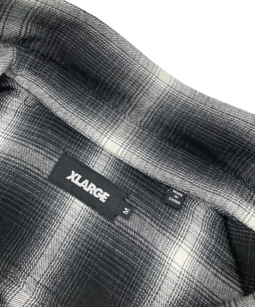 X-LARGE（エクストララージ）X-LARGE (エクストララージ) OLD ENGLISH L/S FLANNEL SHIRT ブラック×ホワイト サイズ:Mの古着・服飾アイテム