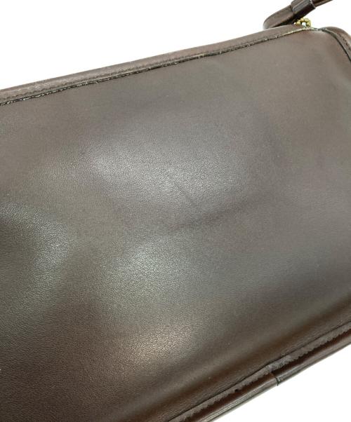 COACH（コーチ）COACH (コーチ) クラッチバッグ ブラウンの古着・服飾アイテム