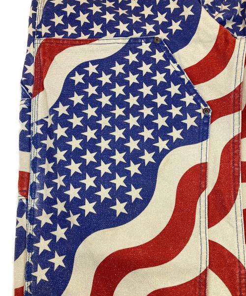 SUPREME（シュプリーム）SUPREME (シュプリーム) Flag Double Knee Painter Pant ブルー×レッド サイズ:32の古着・服飾アイテム