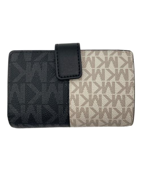 MICHAEL KORS（マイケルコース）MICHAEL KORS (マイケルコース) JET SET TRAVELツートーンビルフォールドジップ コンパクト ウォレット ミディアム ブラック×ホワイトの古着・服飾アイテム