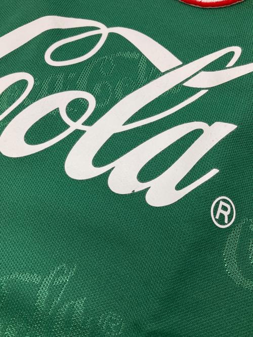 Coca Cola（コカコーラ）Coca Cola (コカコーラ) ［古着］長袖カットソー グリーン サイズ:Freeの古着・服飾アイテム