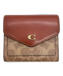 COACH（コーチ）の古着「ウィン スモール ウォレット カラーブロック シグネチャー キャンバス」｜ブラウン