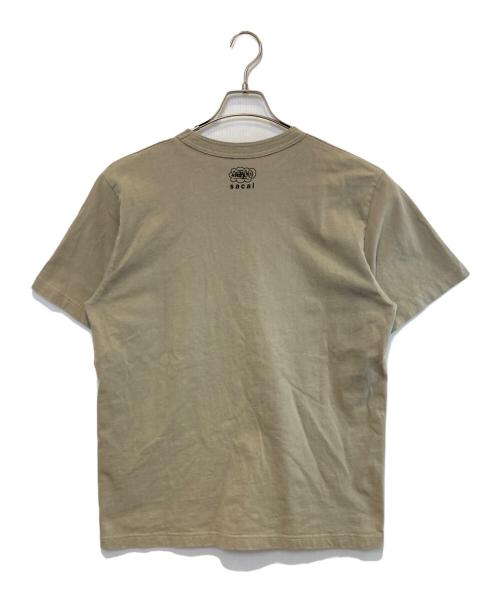 sacai（サカイ）sacai (サカイ) eric haze (エリック・ヘイズ) AS ONE T-Shirt オリーブ サイズ:3の古着・服飾アイテム