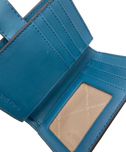 MICHAEL KORS（マイケルコース）MICHAEL KORS (マイケルコース) コンパクトウォレット ブルーの古着・服飾アイテム