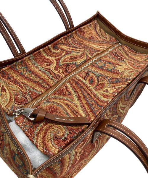 A VACATION（ア ヴァケーション）A VACATION (ア ヴァケーション) CLUB BAG ORANGE PAISLEY ブラウンの古着・服飾アイテム