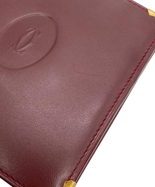 Cartier（カルティエ）Cartier (カルティエ) マストライン2つ折り財布 ボルドーの古着・服飾アイテム