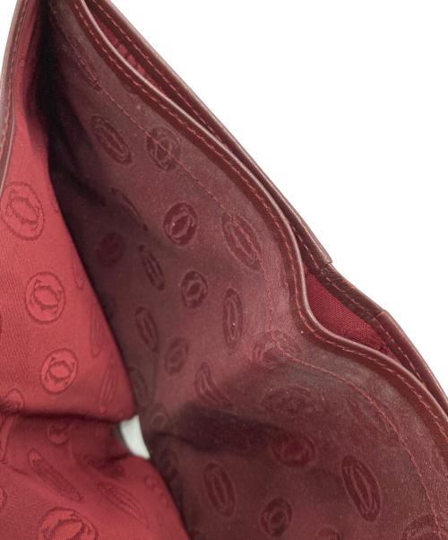 Cartier（カルティエ）Cartier (カルティエ) マストライン2つ折り財布 ボルドーの古着・服飾アイテム
