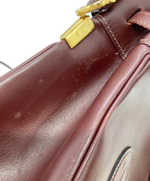 Cartier（カルティエ）Cartier (カルティエ) マストライン巾着ショルダーバッグ ボルドーの古着・服飾アイテム