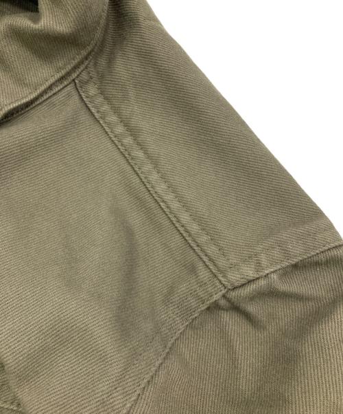 JUNYA WATANABE COMME des GARCONS（(ジュンヤワタナベ コムデギャルソン）JUNYA WATANABE COMME des GARCONS ((ジュンヤワタナベ コムデギャルソン) カットオフトラッカージャケット オリーブ サイズ:不明の古着・服飾アイテム