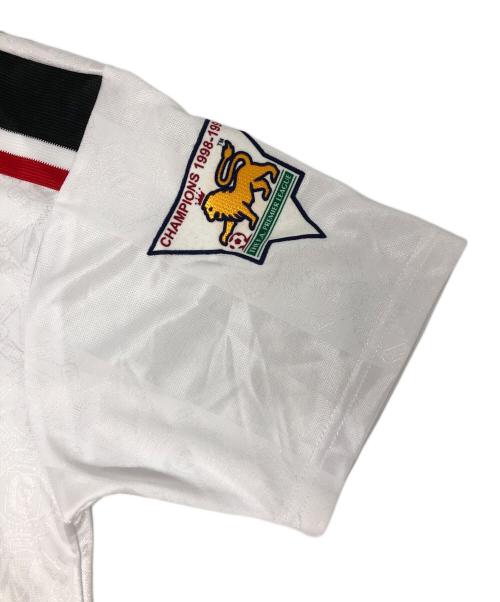 UMBRO（アンブロ）UMBRO (アンブロ) 90sマンチェスターユナイテッドゲームシャツ ホワイト×ブラック サイズ:Lの古着・服飾アイテム