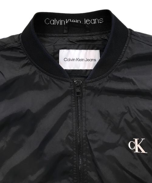 Calvin Klein Jeans（カルバンクラインジーンズ）Calvin Klein Jeans (カルバンクラインジーンズ) CKロゴプリントブルゾン ブラック サイズ:Lの古着・服飾アイテム