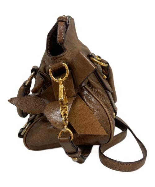 MIU MIU（ミュウミュウ）MIU MIU (ミュウミュウ) ヴィッテロ サイドリボン 2WAYバッグ ブラウンの古着・服飾アイテム
