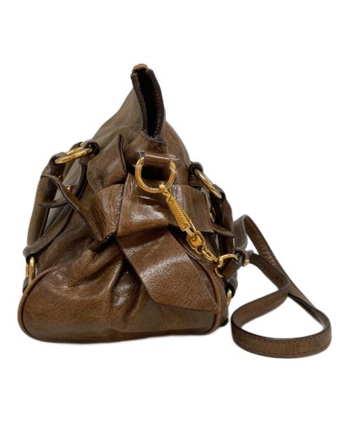 MIU MIU（ミュウミュウ）MIU MIU (ミュウミュウ) ヴィッテロ サイドリボン 2WAYバッグ ブラウンの古着・服飾アイテム