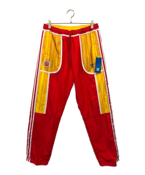 adidas（アディダス）adidas (アディダス) Eric Emanuel (エリック エマニュエル) McDonald's (マクドナルド) コラボリバーシブルパンツ レッド×ベージュ サイズ:Mの古着・服飾アイテム