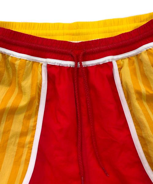 adidas（アディダス）adidas (アディダス) Eric Emanuel (エリック エマニュエル) McDonald's (マクドナルド) コラボリバーシブルパンツ レッド×ベージュ サイズ:Mの古着・服飾アイテム