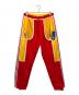 adidas（アディダス）の古着「コラボリバーシブルパンツ」｜レッド×ベージュ