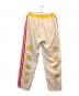 中古・古着 adidas (アディダス) Eric Emanuel (エリック エマニュエル) McDonald's (マクドナルド) コラボリバーシブルパンツ レッド×ベージュ サイズ:M：7000円