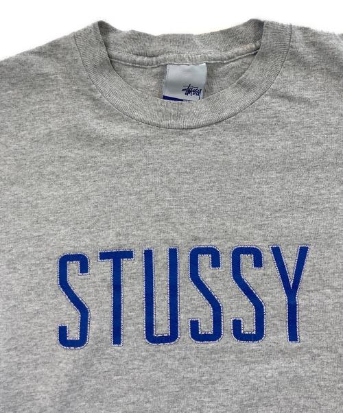 stussy（ステューシー）stussy (ステューシー) オールドロゴTシャツ グレー サイズ:Mの古着・服飾アイテム