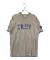 stussy（ステューシー）の古着「オールドロゴTシャツ」｜グレー