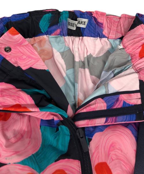 ISSEY MIYAKE（イッセイミヤケ）ISSEY MIYAKE (イッセイミヤケ) パッカブルフラワープリント2WAYパンツ ピンク サイズ:2の古着・服飾アイテム