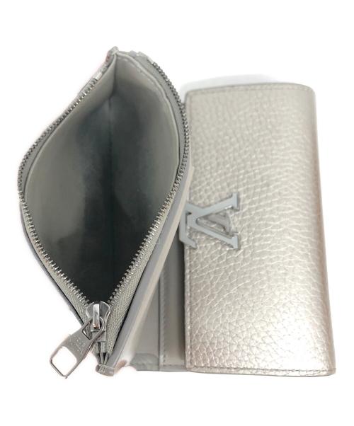 LOUIS VUITTON（ルイ ヴィトン）LOUIS VUITTON (ルイ ヴィトン) トリヨン ポルトフォイユカプシーヌコンパクト シルバーの古着・服飾アイテム
