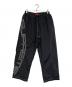 Supreme（シュプリーム）の古着「Spellout Embroidered Track Pant」｜ブラック