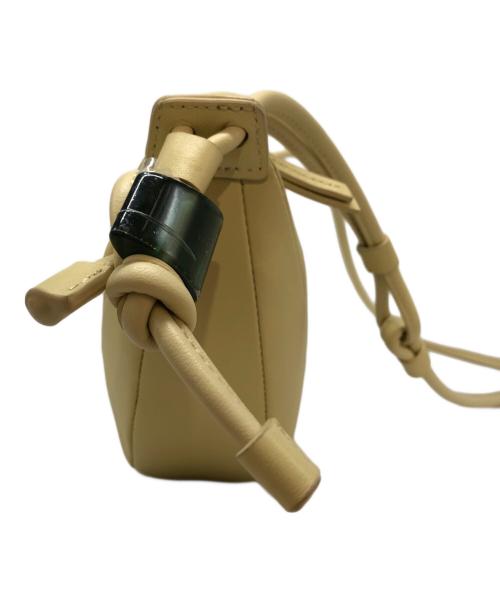 Archivepke（アーカイブエプク）Archivepke (アーカイブエプク) Small fling bag イエローの古着・服飾アイテム