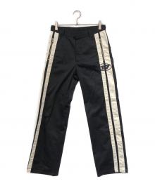DIESEL（ディーゼル）の古着「サイドラインパンツ」｜ブラック