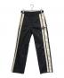 DIESEL（ディーゼル）の古着「サイドラインパンツ」｜ブラック