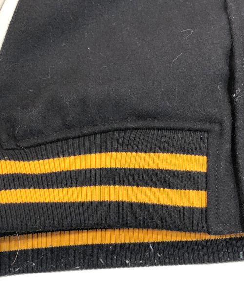 X-LARGE（エクストララージ）X-LARGE (エクストララージ) SPACE JAM (スペースジャム) VARSITY JACKET ホワイト×ブラック サイズ:SIZE Mの古着・服飾アイテム