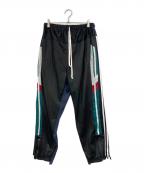 DISCOVEREDディスカバード）の古着「ドッキングトラックパンツ」｜ネイビー