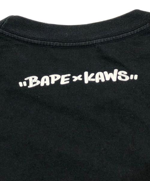 A BATHING APE（アベイシングエイプ）A BATHING APE (アベイシングエイプ) KAWS (カウズ) オールドフェイス ブラック サイズ:-の古着・服飾アイテム