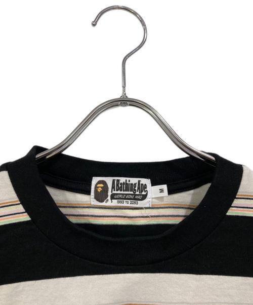A BATHING APE（アベイシングエイプ）A BATHING APE (アベイシングエイプ) STRIPE ONE POINT RELAXED FIT POCKET LS TEE ブラック サイズ:SIZE Mの古着・服飾アイテム