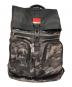 TUMI（トゥミ）の古着「ロールトップ バックパック」｜グレー×ブラック