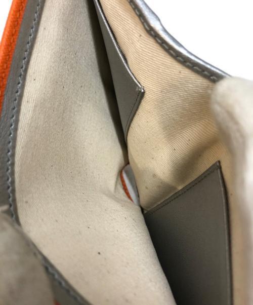 Vivienne Westwood（ヴィヴィアンウエストウッド）Vivienne Westwood (ヴィヴィアンウエストウッド) 2つ折り財布 オレンジの古着・服飾アイテム