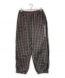 SUPREME（シュプリーム）の古着「チェックトラックパンツ」｜ベージュ