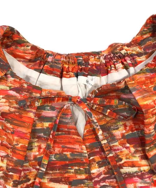 HERALBONY（ヘラルボニー）HERALBONY (ヘラルボニー) ラッフルワンピース「からくちカレー」 オレンジ サイズ:SIZE Freeの古着・服飾アイテム