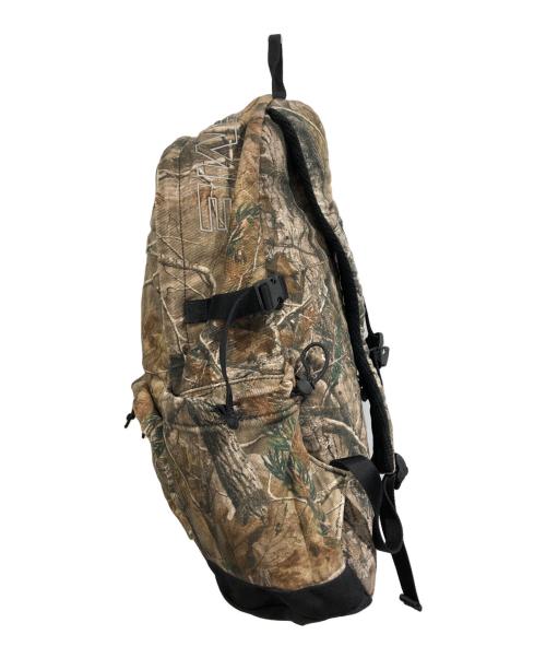 SUPREME（シュプリーム）SUPREME (シュプリーム) Denim Backpack Realtree ブラウン×グリーンの古着・服飾アイテム