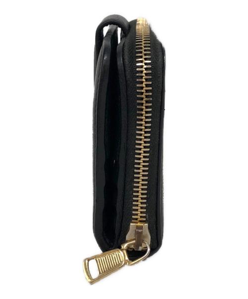Yves Saint Laurent（イヴサンローラン）Yves Saint Laurent (イヴサンローラン) ラウンドジップウォレット ブラックの古着・服飾アイテム