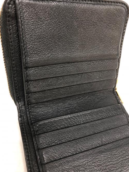 Yves Saint Laurent（イヴサンローラン）Yves Saint Laurent (イヴサンローラン) ラウンドジップウォレット ブラックの古着・服飾アイテム