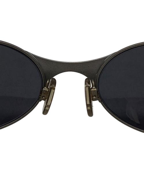 OAKLEY（オークリー）OAKLEY (オークリー) E-WIREオーバルサングラス グレーの古着・服飾アイテム