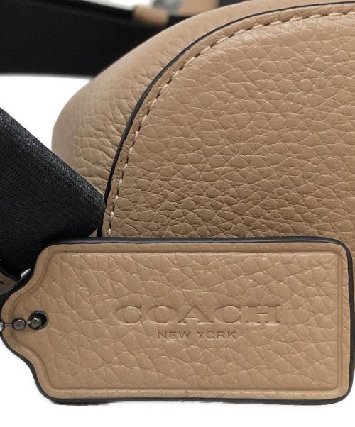 COACH（コーチ）COACH (コーチ) ドミニク スリング パック / ワンショルダーバッグ ベージュの古着・服飾アイテム